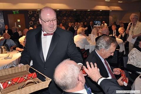 Call My Bluff - Sean Groat hands out the prizes to the winning table 