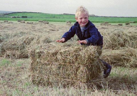 Rolling a bale