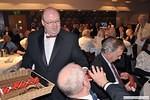 Call My Bluff - Sean Groat hands out the prizes to the winning table 